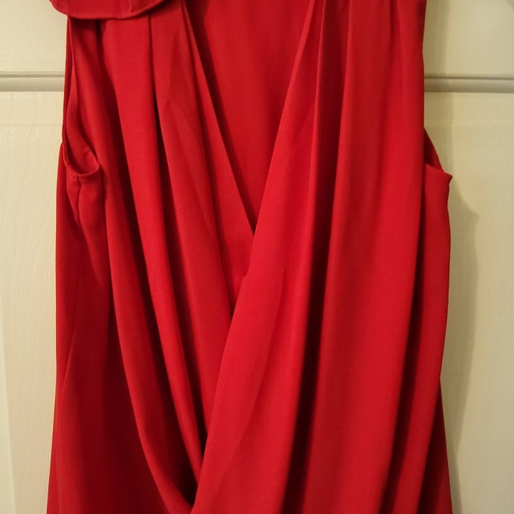 Fall and the holidays are coming! Enjoy your day in this beautiful draped  top.
